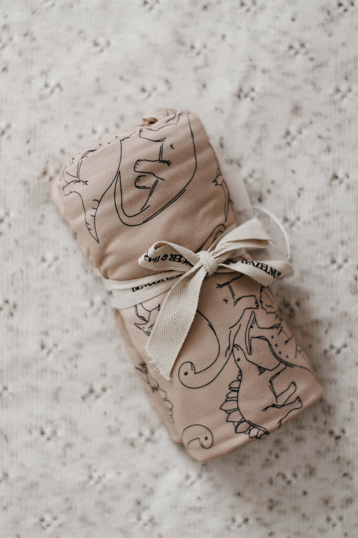 Dino Jersey Swaddle | Brown